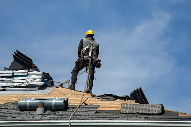 Professional Roofing technician working in Moss, TN